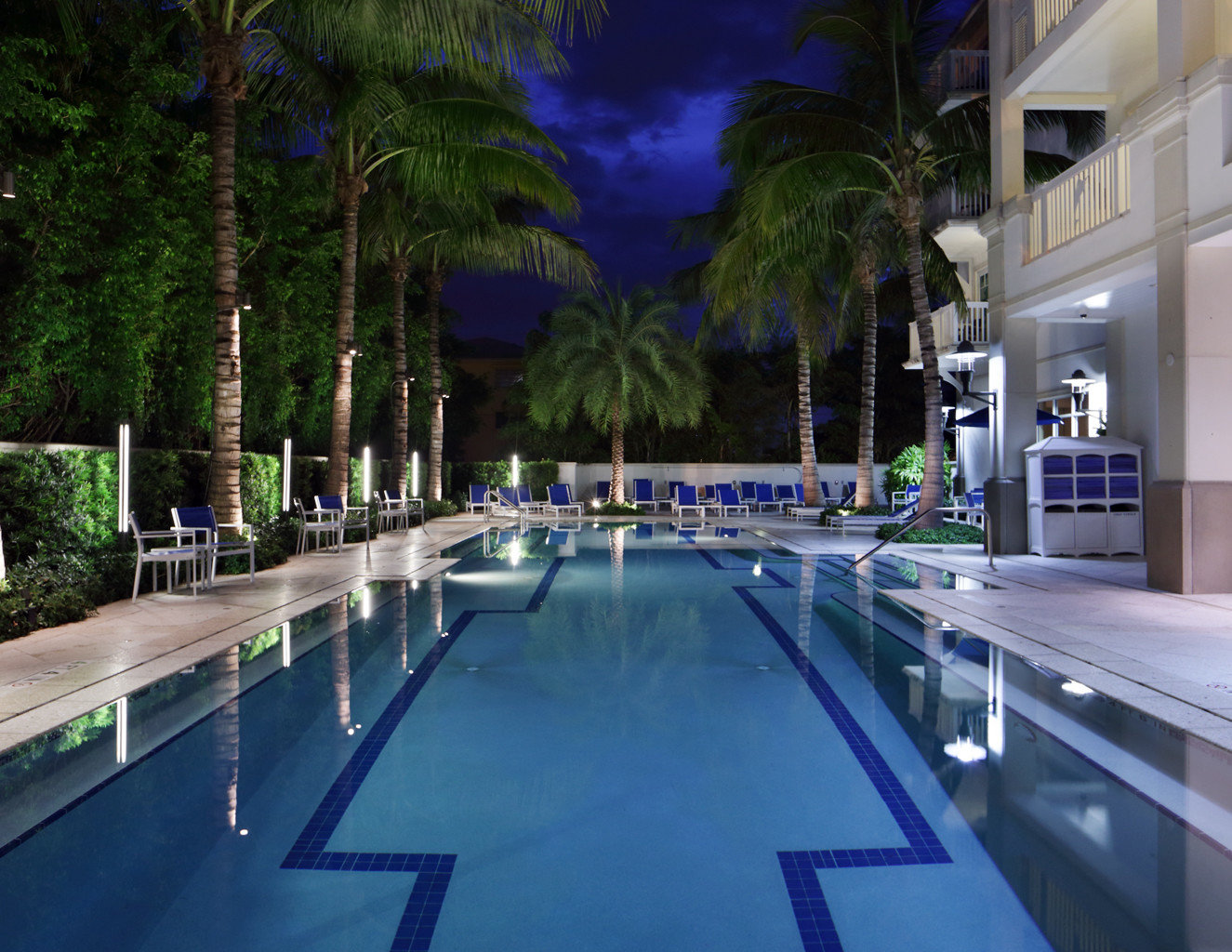 Exterior Pool tree swimming pool leisure Resort condominium reflecting pool way road lined