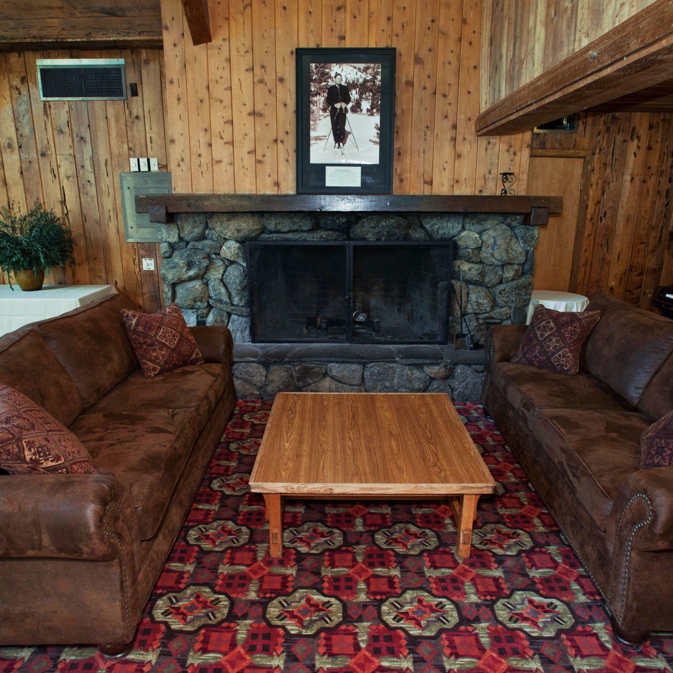 sofa living room property home house cottage log cabin Fireplace mansion screenshot farmhouse