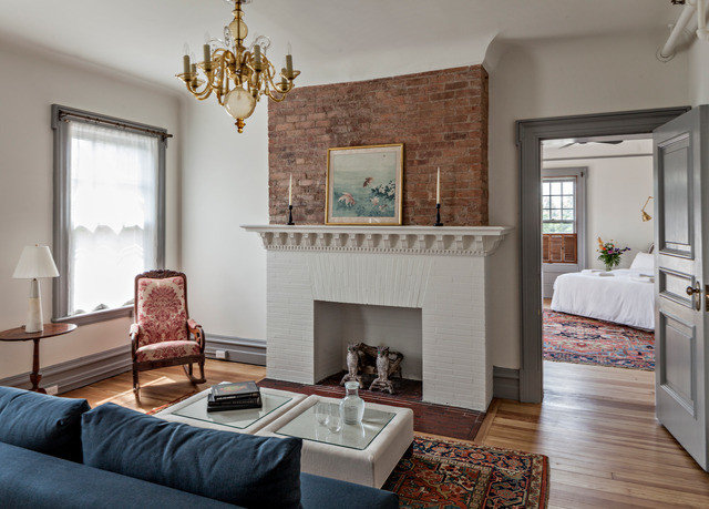 sofa living room hearth home Fireplace interior designer house flooring hardwood leather