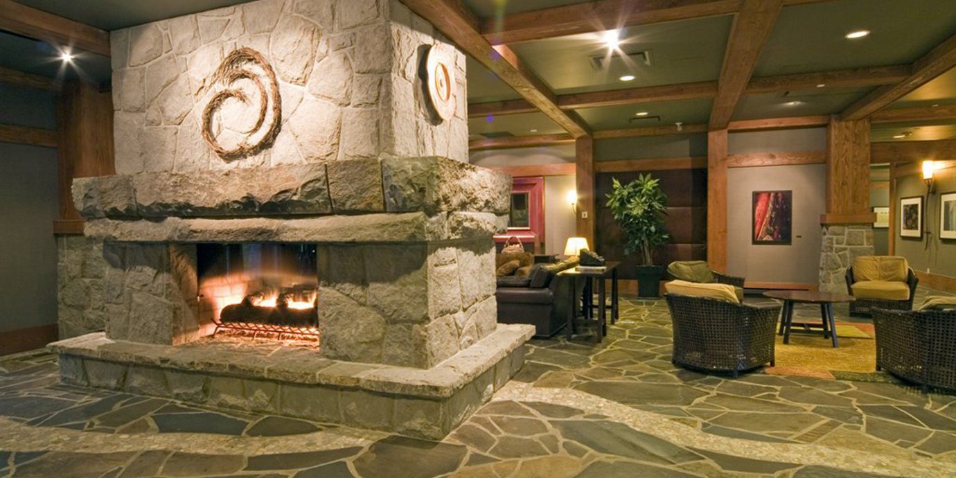 Lobby Lodge Lounge Mountains Outdoor Activities Scenic views building Fireplace home hearth living room flooring stone old