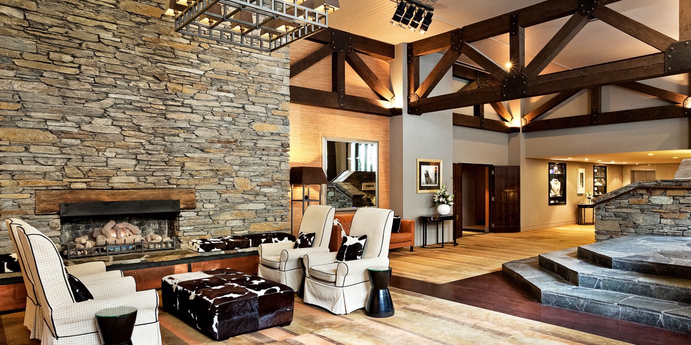 Fireplace Lounge property living room hardwood home farmhouse wood flooring flooring cottage mansion Villa Lobby loft stone