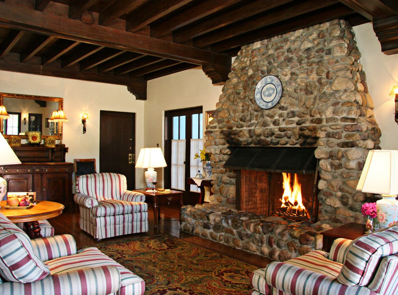 Fireplace Lounge Luxury sofa fire property living room home cottage farmhouse stone Villa