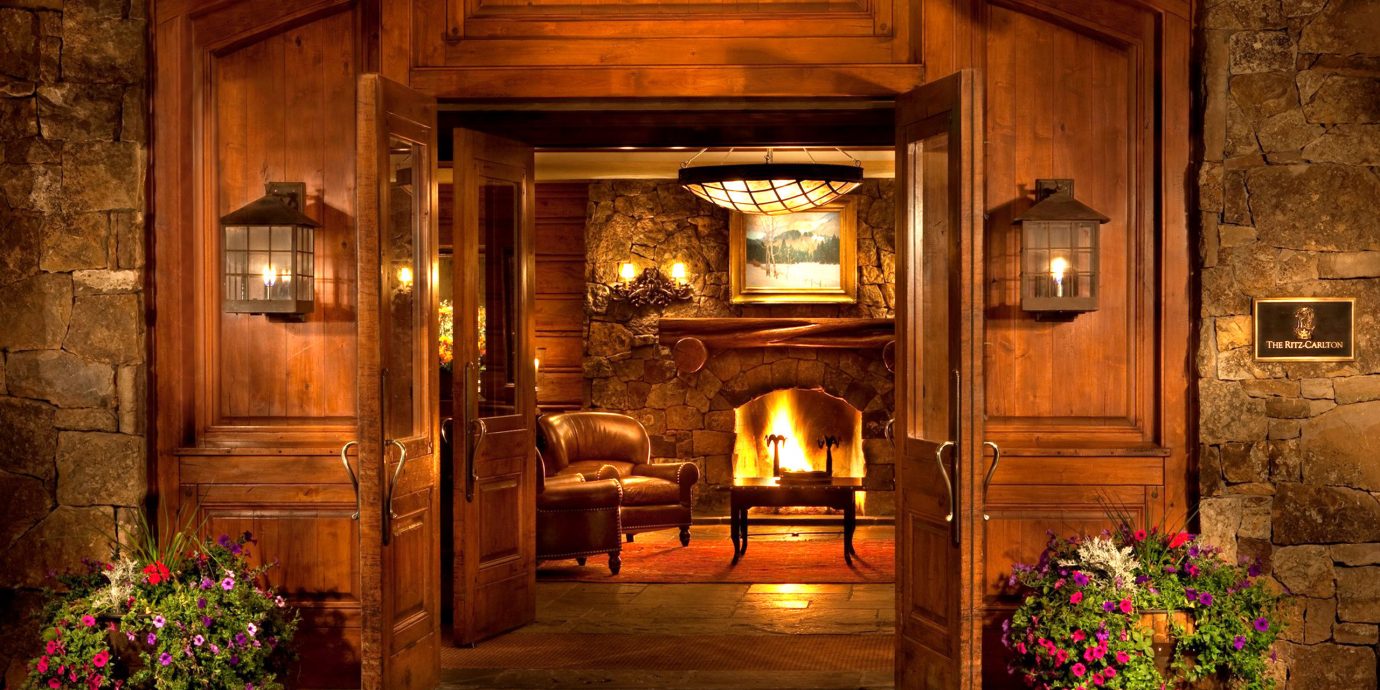 Fireplace Lounge Resort fire building house mansion home lighting screenshot landscape lighting log cabin living room stone
