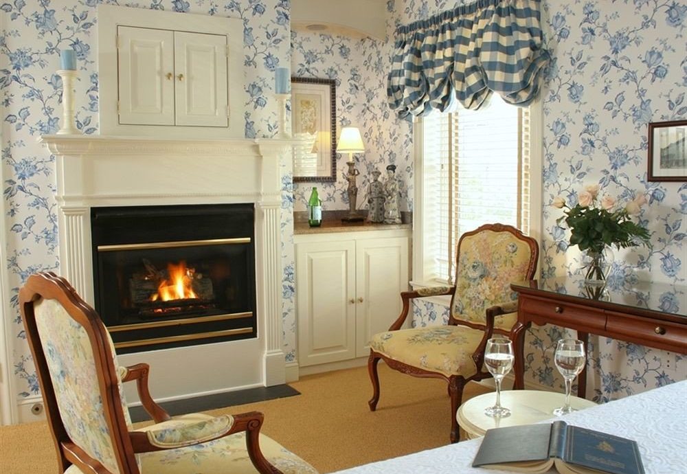 Fireplace Romantic living room fire property chair home cottage hearth Villa farmhouse mansion