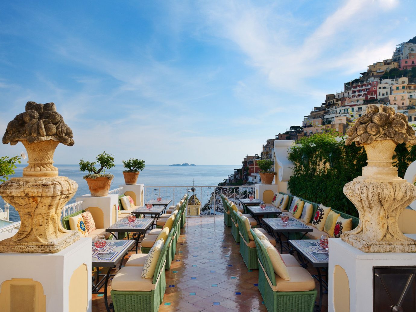Buildings calm Cliffs Dining Elegant europe Hotels houses landscape Luxury Ocean ocean view outdoor dining overlook Patio regal remote serene sophisticated Terrace view sky outdoor vacation landmark tourism palace ancient history travel temple Resort Beach several