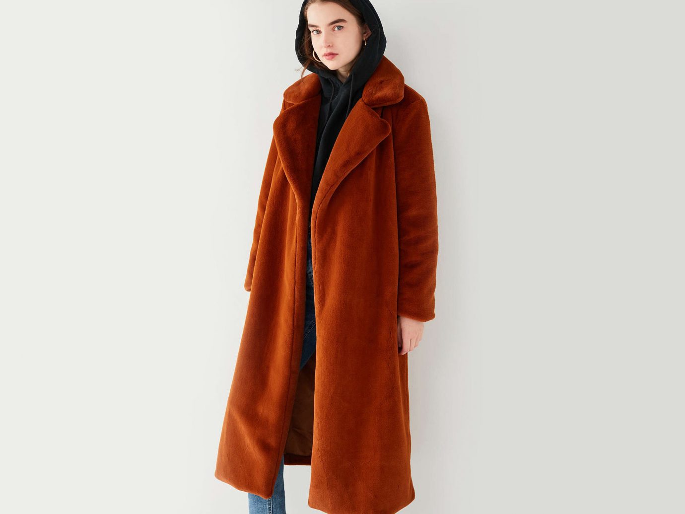 Style + Design Travel Shop fur clothing coat fur wearing hood overcoat jacket neck fashion model dressed orange clothing