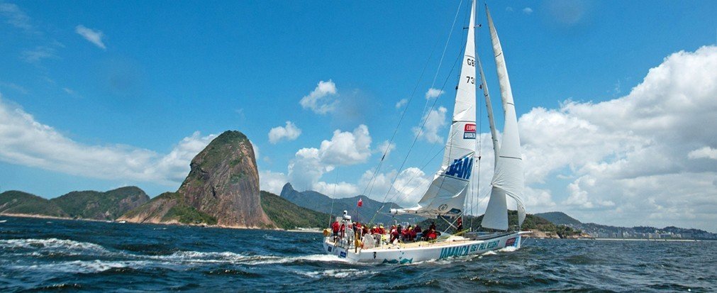 Outdoors + Adventure water outdoor sky Boat mountain watercraft transport sailing sail dinghy sailing sailboat vehicle sailboat racing windsports sports sailing vessel sailing ship yacht racing Sea boating keelboat Lake yacht day