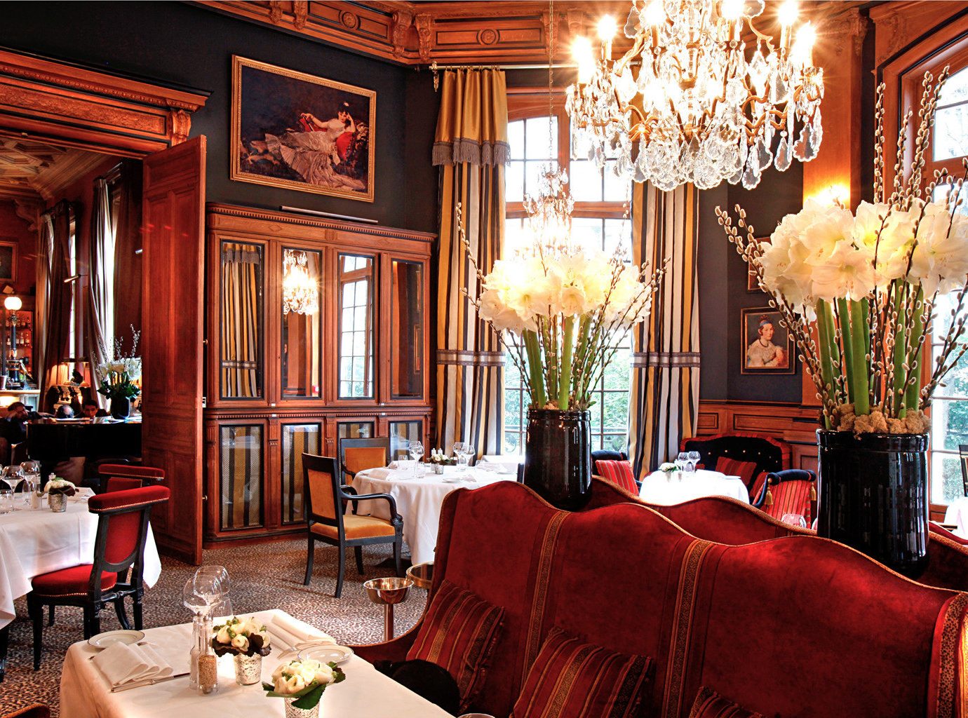 City Dining Drink Eat Elegant France Historic Hotels Lounge Paris Romantic indoor room window Living sofa chair restaurant ceiling dining room estate meal decorated red interior design home furniture function hall Bar nice living room mansion palace area leather
