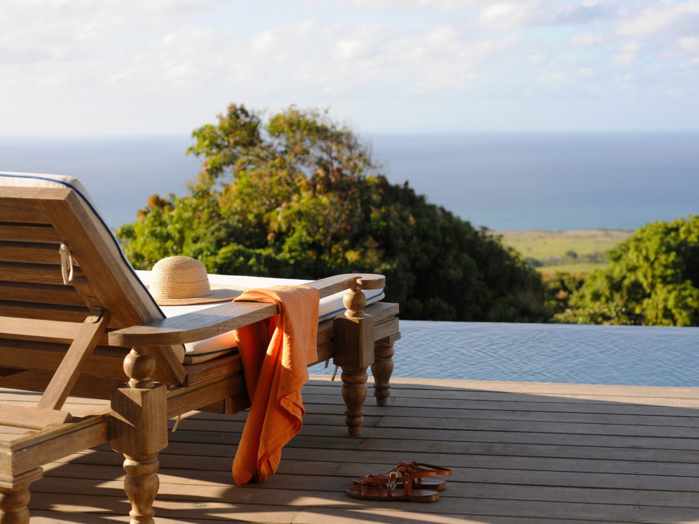 Hotels sky outdoor water leisure vacation furniture wooden wood Beach walkway overlooking seat Deck
