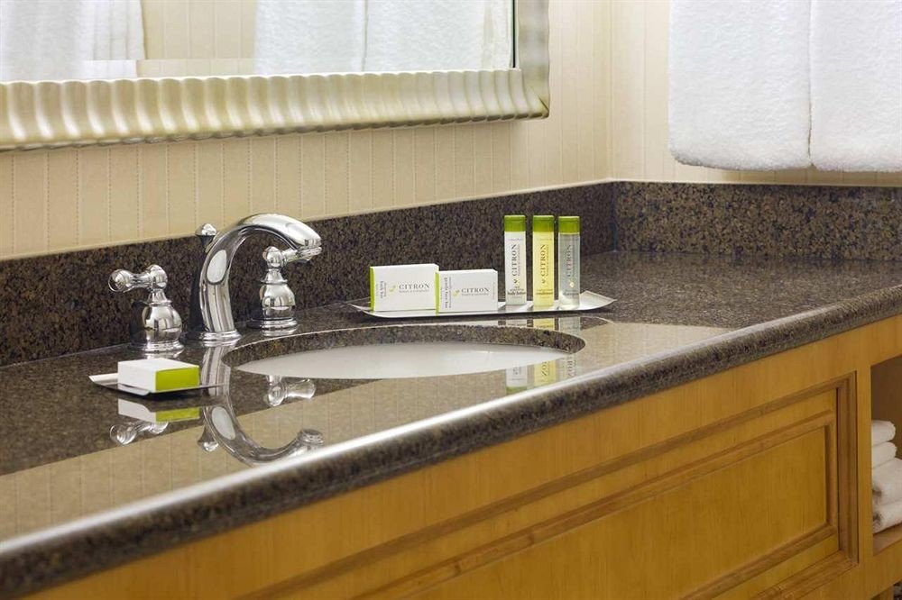 countertop sink counter Kitchen material plumbing fixture flooring bathroom granite