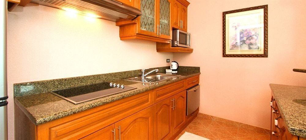 cabinet property home countertop cottage bathroom hardwood wooden Kitchen Suite