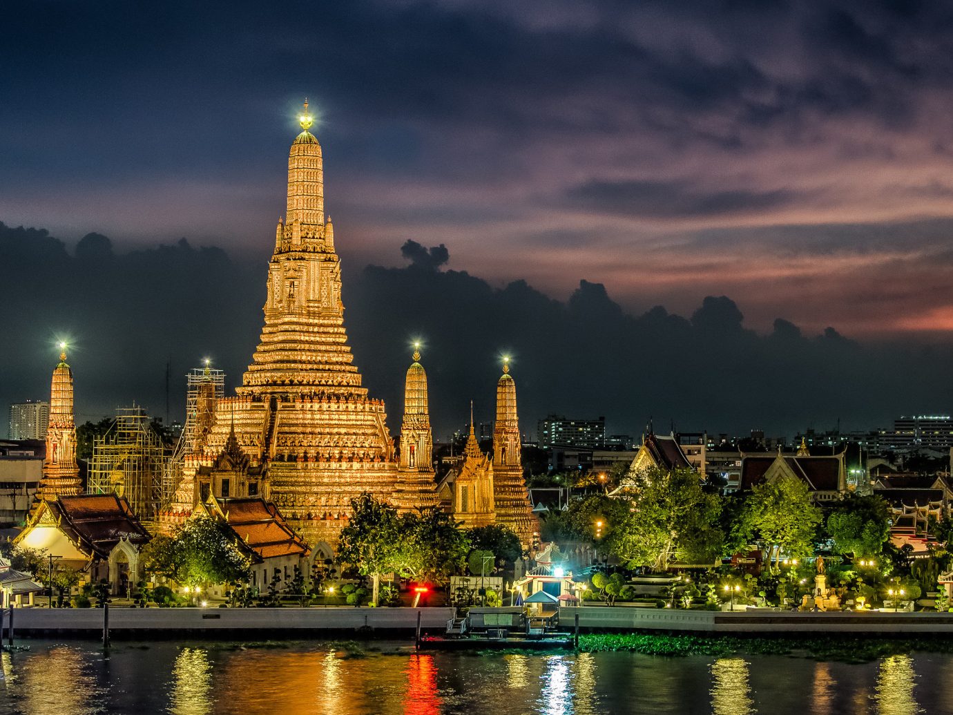 Hotels water sky outdoor River landmark night reflection City cityscape human settlement evening temple skyline dusk pagoda place of worship tower wat cloudy