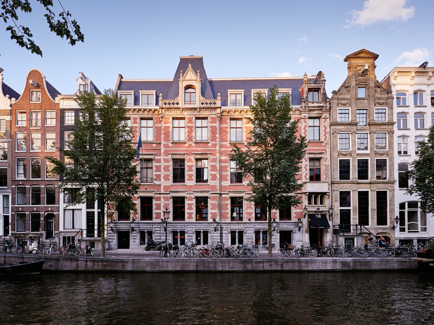Amsterdam Boutique Hotels Hotels The Netherlands building sky water outdoor Canal landmark City waterway Town urban area neighbourhood human settlement Architecture house River cityscape Downtown estate facade town square surrounded several
