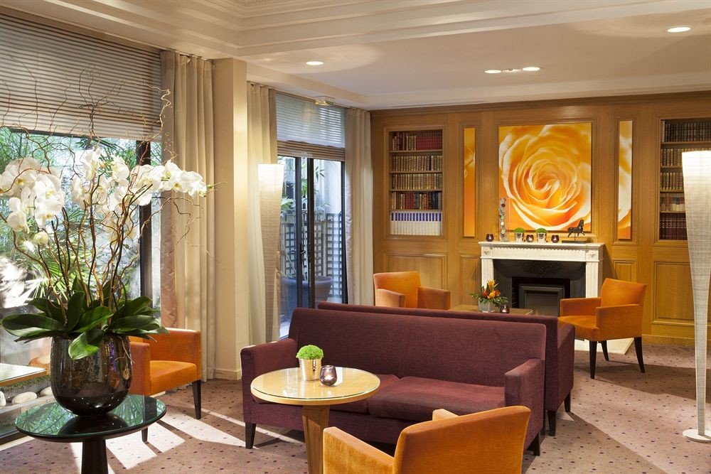 property chair living room Lobby condominium Suite home Resort Villa