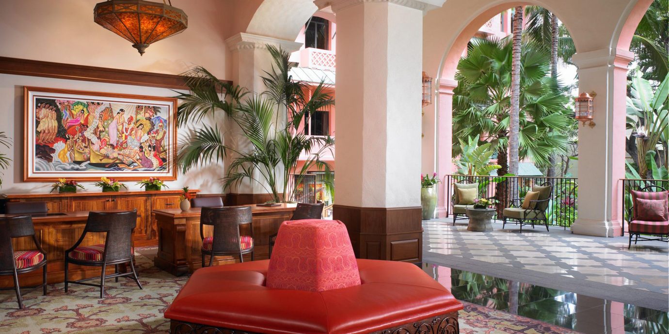 red chair property living room home Lobby mansion hacienda Villa porch pink Resort