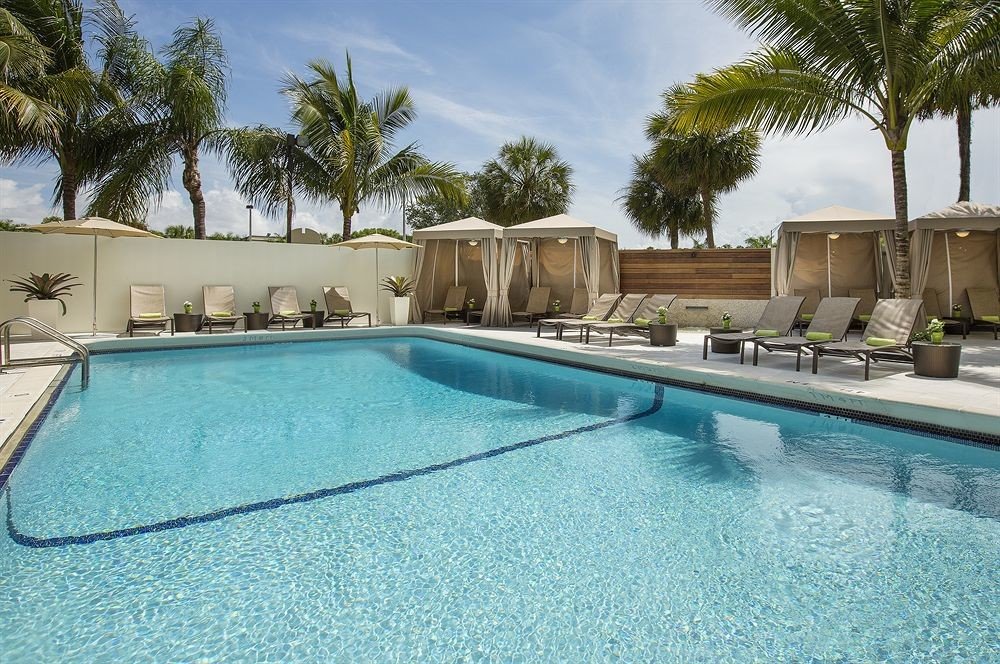 Lounge Luxury Modern Pool tree swimming pool property leisure Villa Resort blue condominium swimming mansion backyard palm bathtub