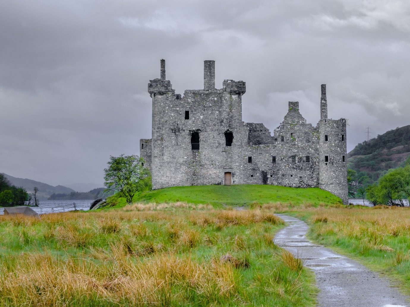 Landmarks Offbeat grass sky outdoor building castle green cloud highland Ruins fortification château tree medieval architecture grassy historic site history stone bastion