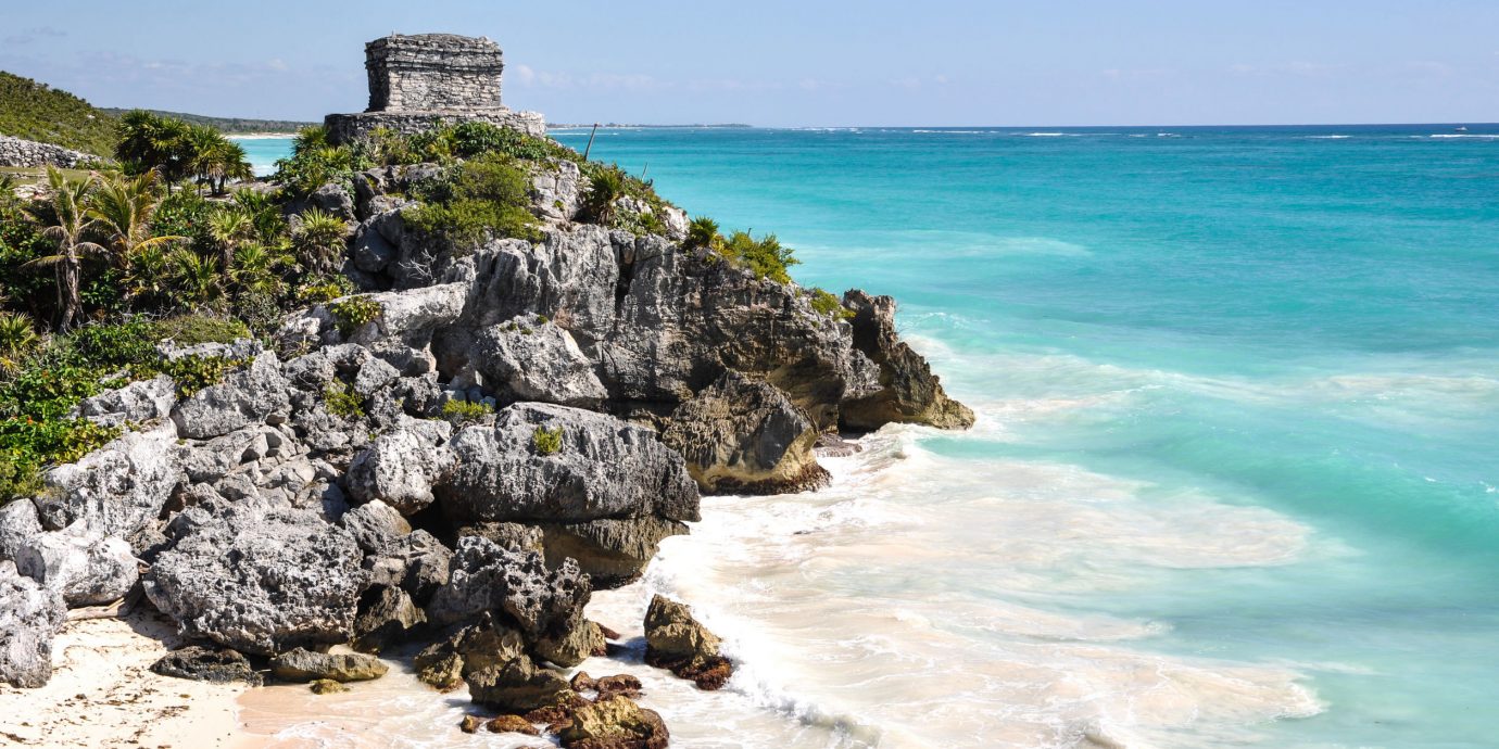 City Mexico Trip Ideas Tulum water outdoor sky rock Nature shore Coast Sea body of water Ocean rocky Beach vacation cove bay islet wind wave cape cliff terrain wave material