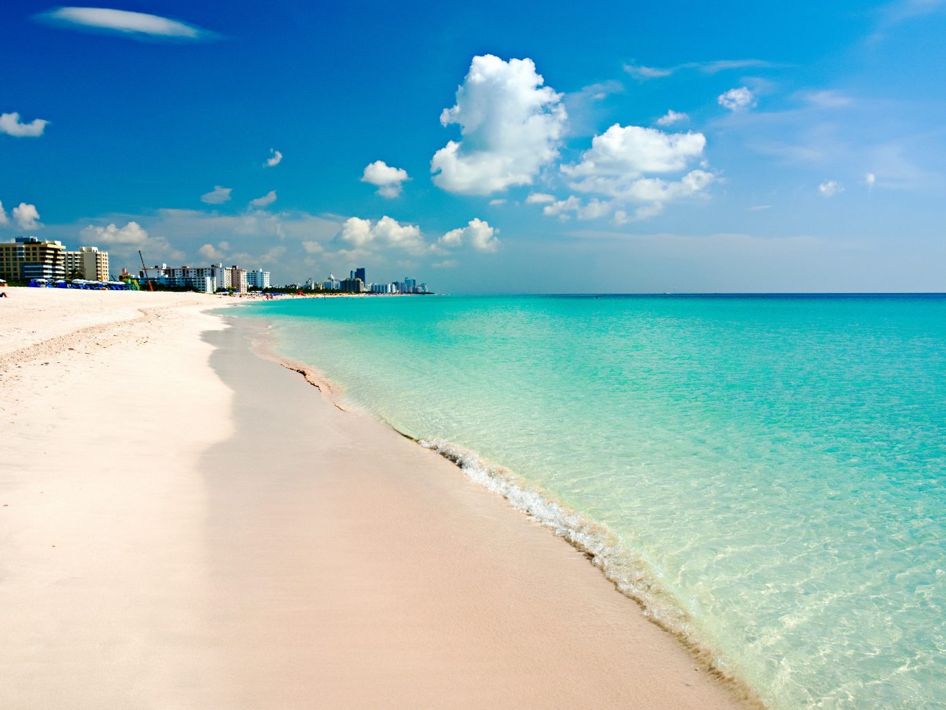 Beach Beachfront Hotels Ocean Outdoors Waterfront sky water outdoor ground Nature Sea shore body of water horizon sand vacation caribbean wave Coast wind wave cloud sunlight sandy bay day