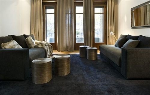 sofa property living room home Suite hardwood condominium cottage flooring rug Modern