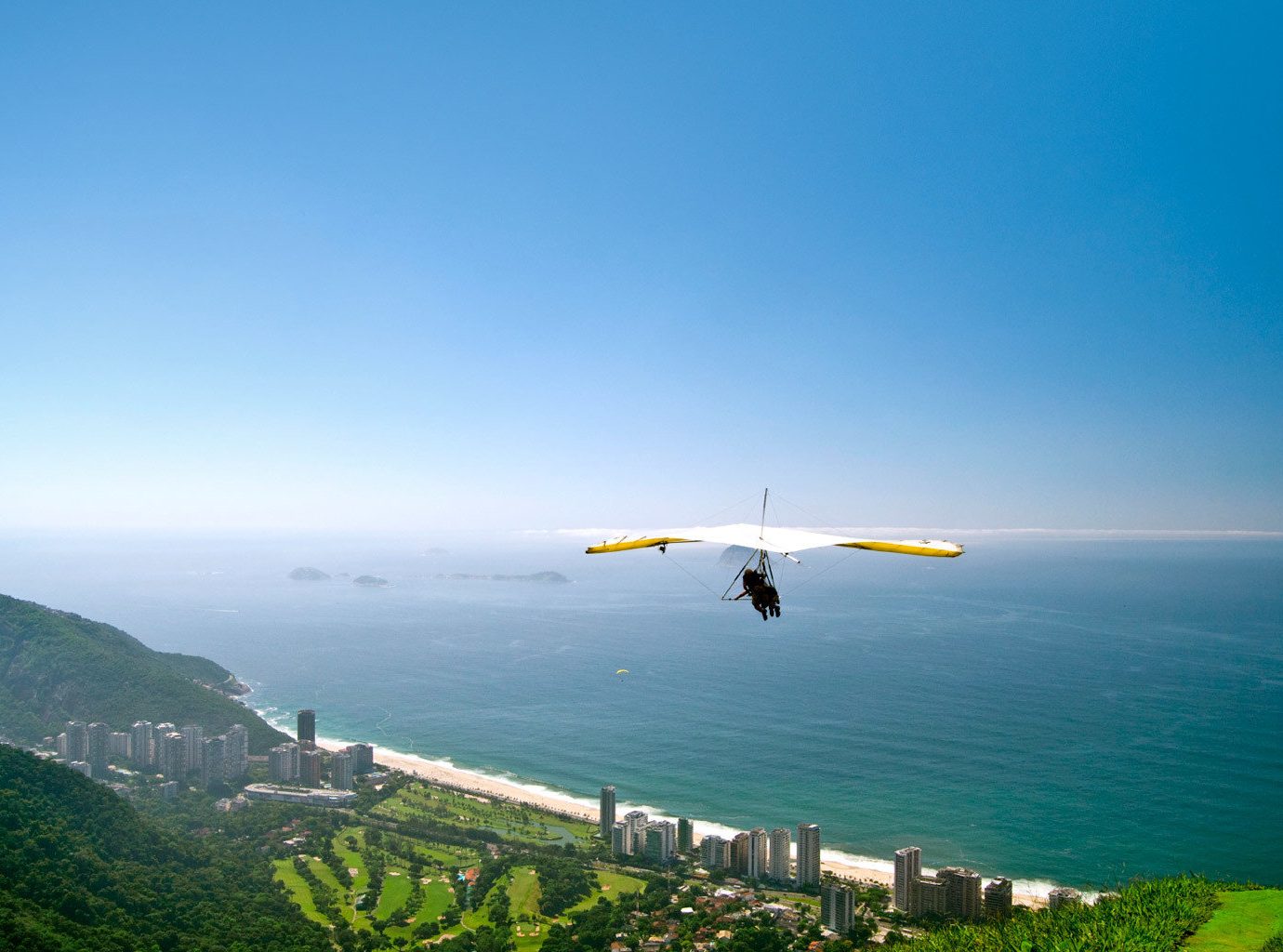 Trip Ideas sky outdoor water Nature flight air sports aircraft horizon atmosphere of earth mountain vehicle gliding Ocean airplane aviation Adventure wing Sea windsports land promontory hillside shore