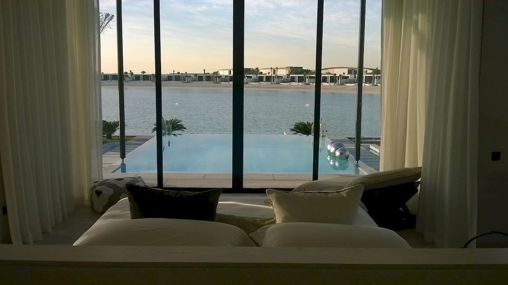 water property condominium house overlooking home Ocean swimming pool living room