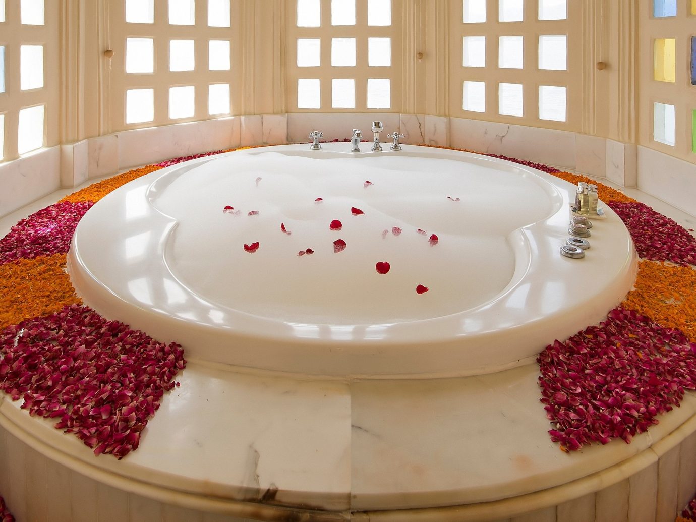 Hotels Luxury Travel plate table window indoor bathtub ceramic white plumbing fixture decorated jacuzzi amenity flooring plant fresh