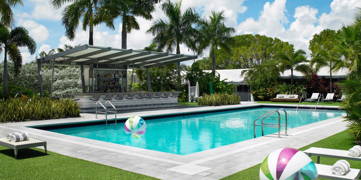 Trip Ideas tree grass swimming pool leisure property Villa backyard Resort green home condominium Pool park mansion