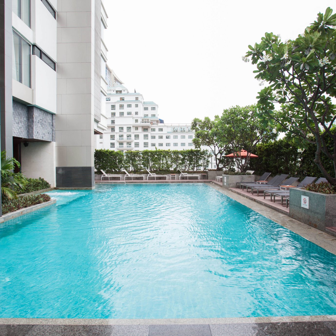 Pool water swimming swimming pool property Resort leisure condominium reflecting pool blue Villa backyard empty