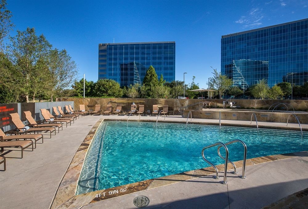 sky ground Pool swimming pool property leisure condominium Resort reflecting pool blue plaza backyard Villa swimming