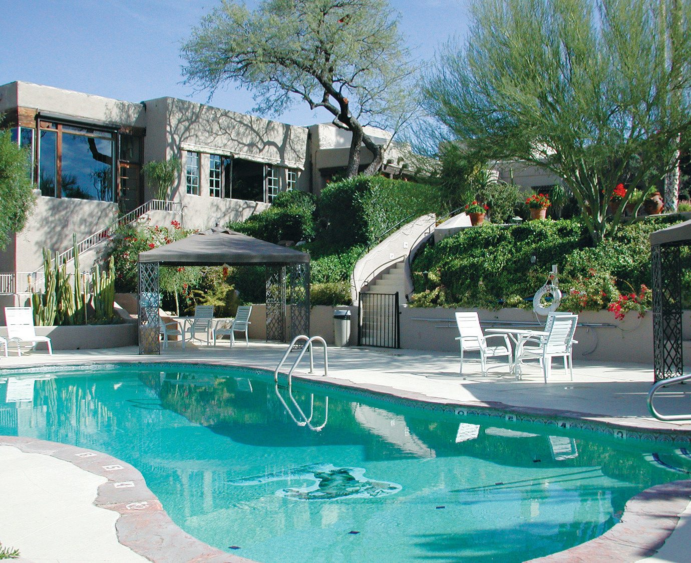 tree swimming pool property Resort condominium Pool backyard water sport home Villa mansion swimming