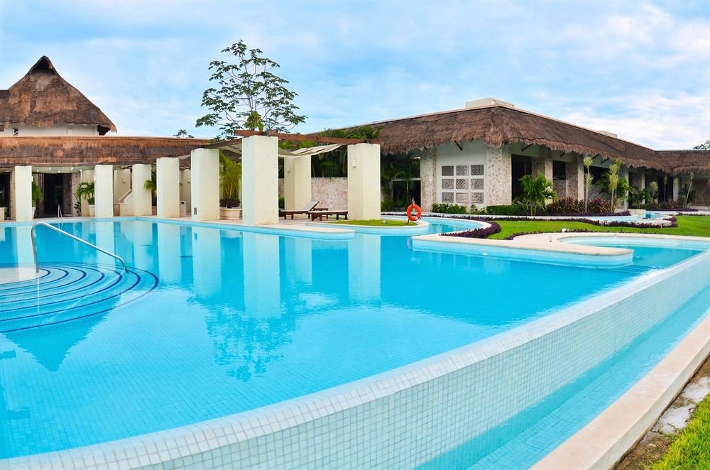 sky building swimming pool property leisure house Resort Villa blue Pool backyard lawn