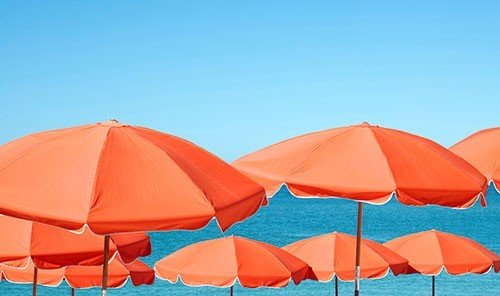 Travel Tips umbrella sky outdoor chair accessory orange lawn tent fashion accessory lined parachute wind outdoor object shade swimming day several