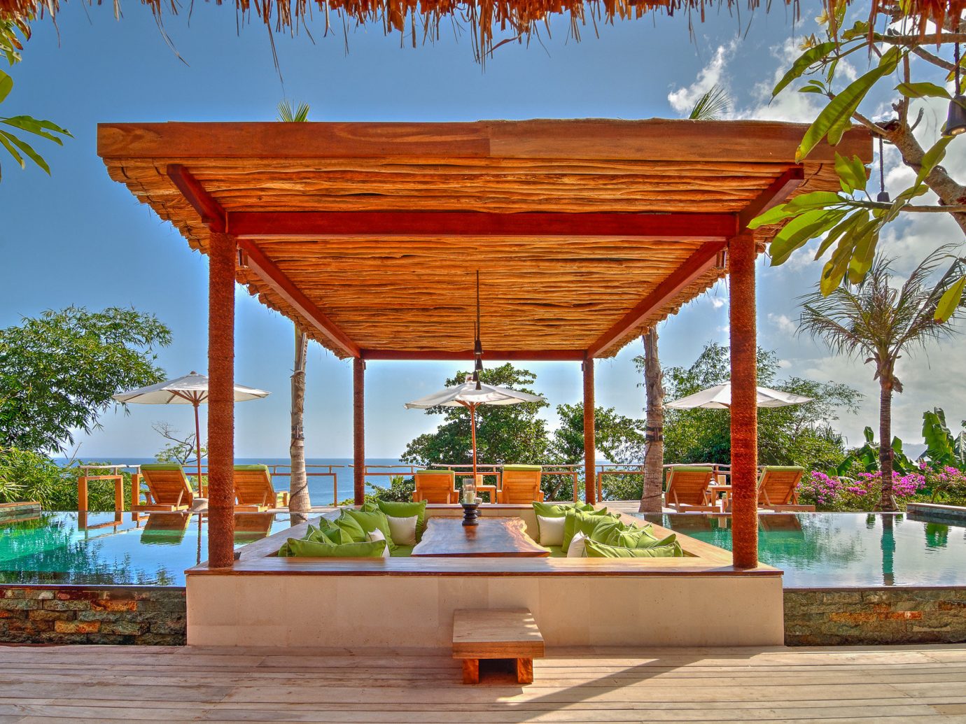 Beach Islands Luxury Travel Trip Ideas tree outdoor sky building pavilion estate outdoor structure shrine temple Resort furniture