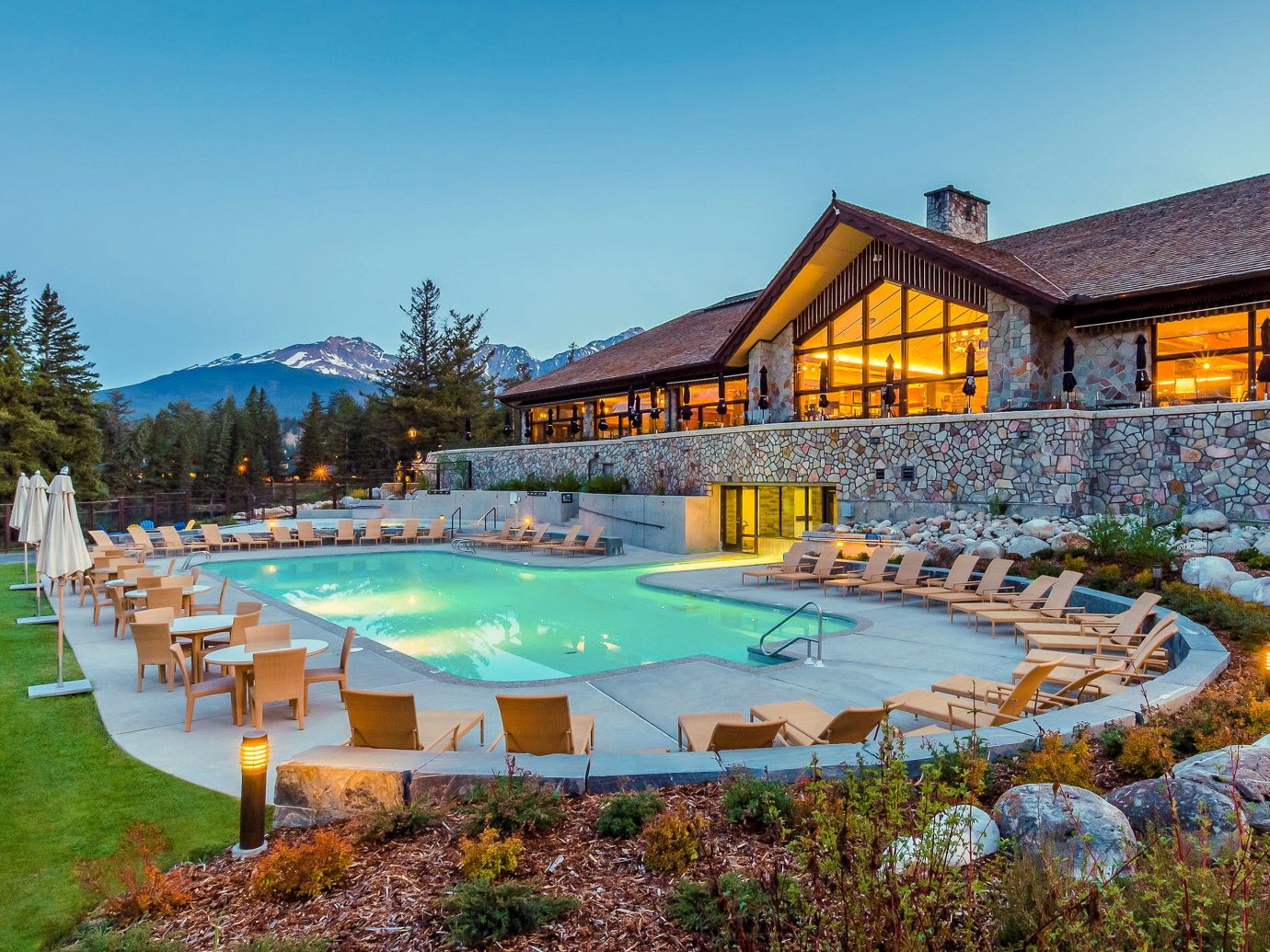 Alberta Boutique Hotels Canada Hotels Road Trips swimming pool property Resort leisure estate resort town water real estate home reflection Villa house sky landscape cottage vacation amenity