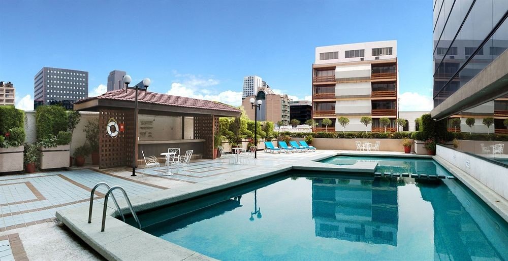 sky property swimming pool condominium building home Villa mansion Resort