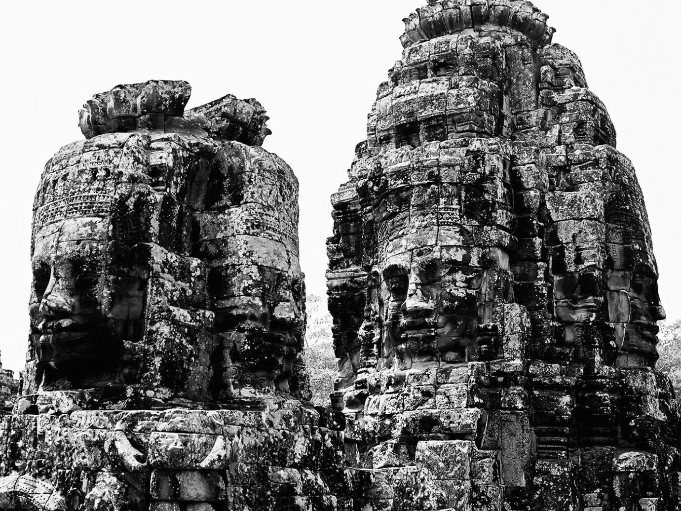 Offbeat tree black and white outdoor historic site archaeological site landmark stone carving hindu temple building monument monochrome photography rock Ruins statue monochrome ancient history place of worship temple maya civilization sculpture monolith old stone