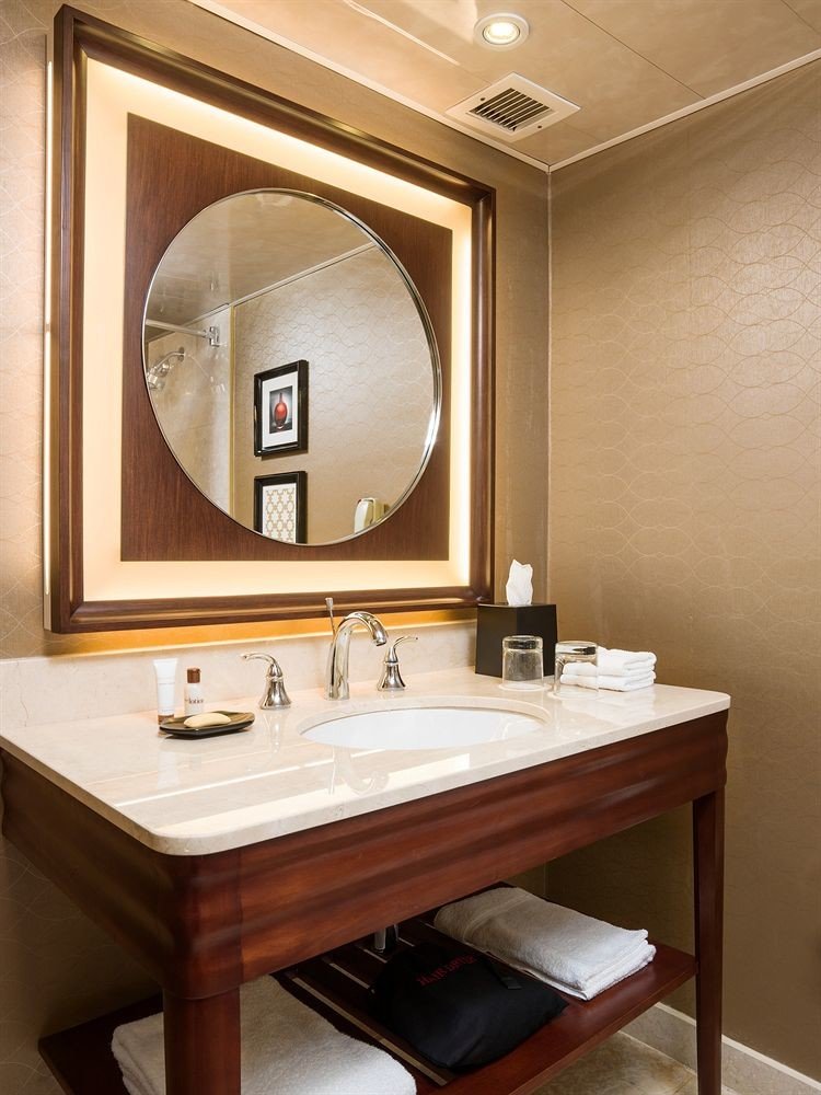 bathroom mirror sink plumbing fixture Suite cabinetry lighting bathroom cabinet