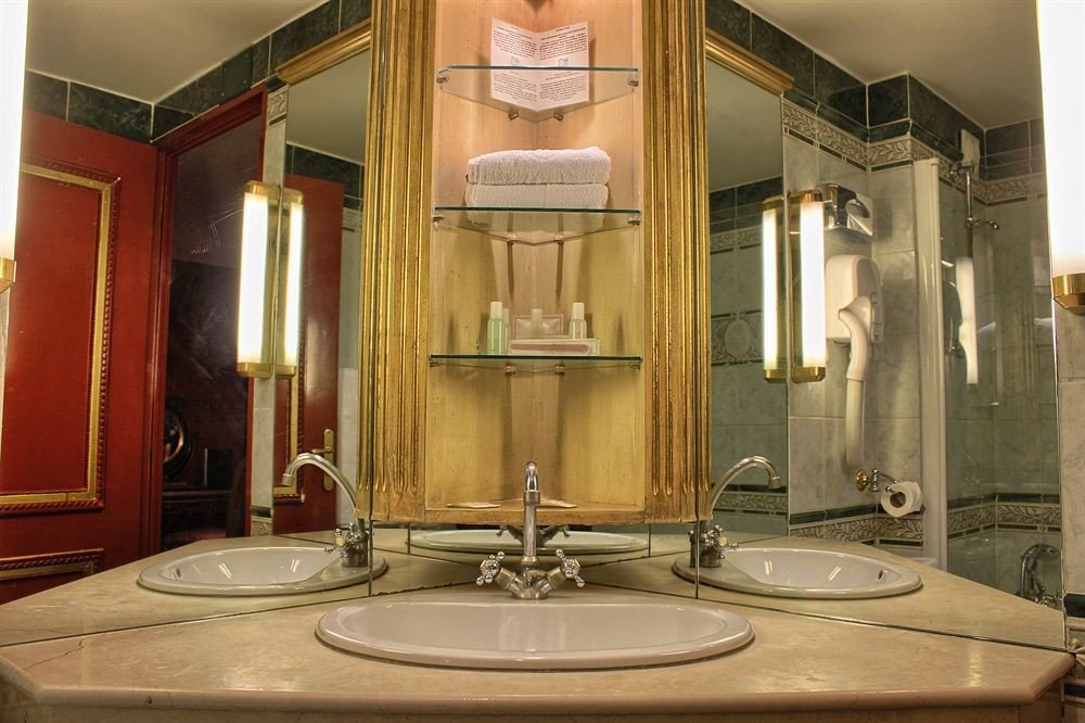 bathroom sink mirror property toilet home mansion lighting cabinetry Suite water basin