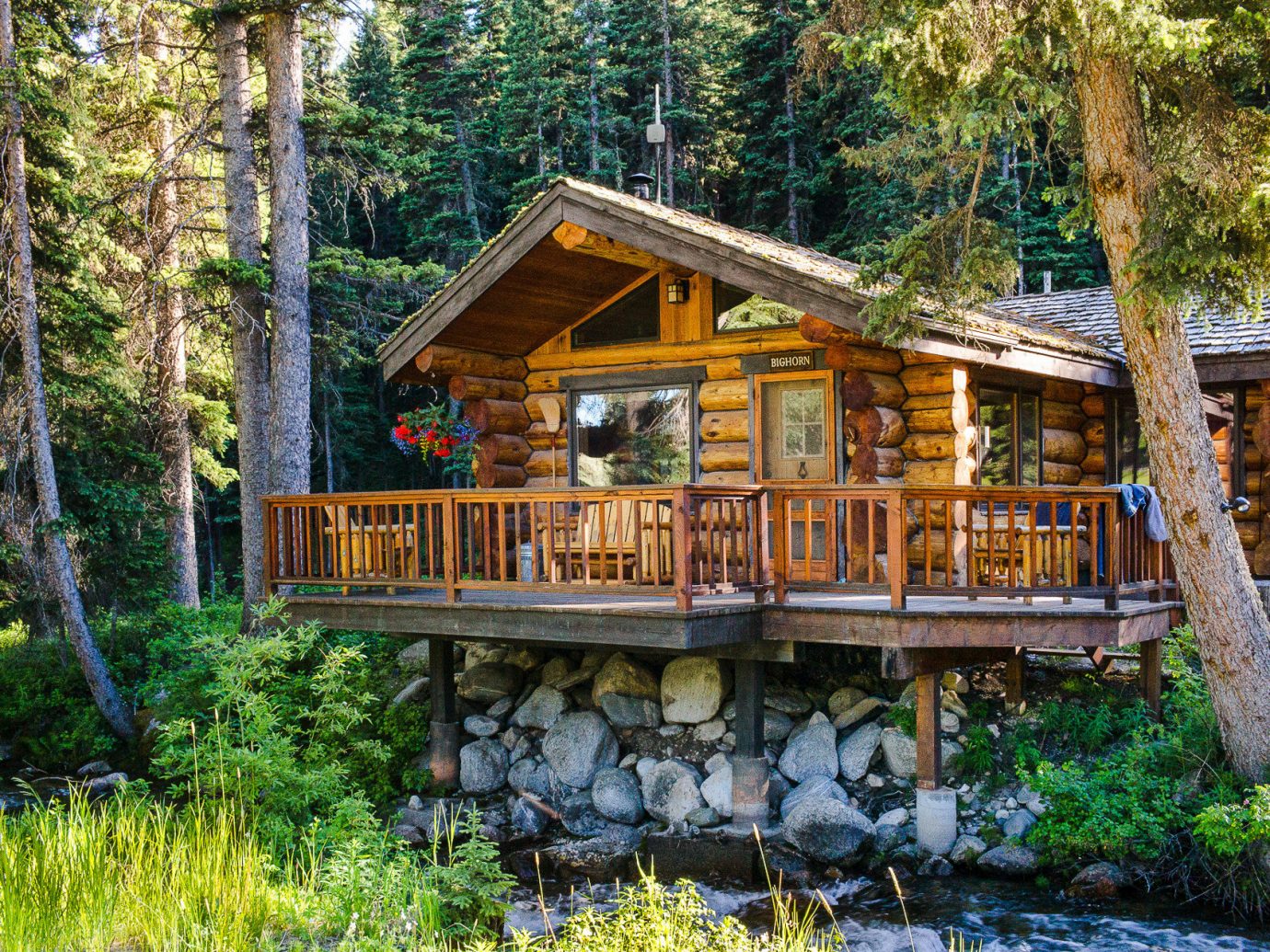 Glamping Hotels Montana Outdoors + Adventure Trip Ideas cottage log cabin home property tree wilderness plant house real estate outdoor structure landscape hut wood woodland old growth forest estate bayou shack