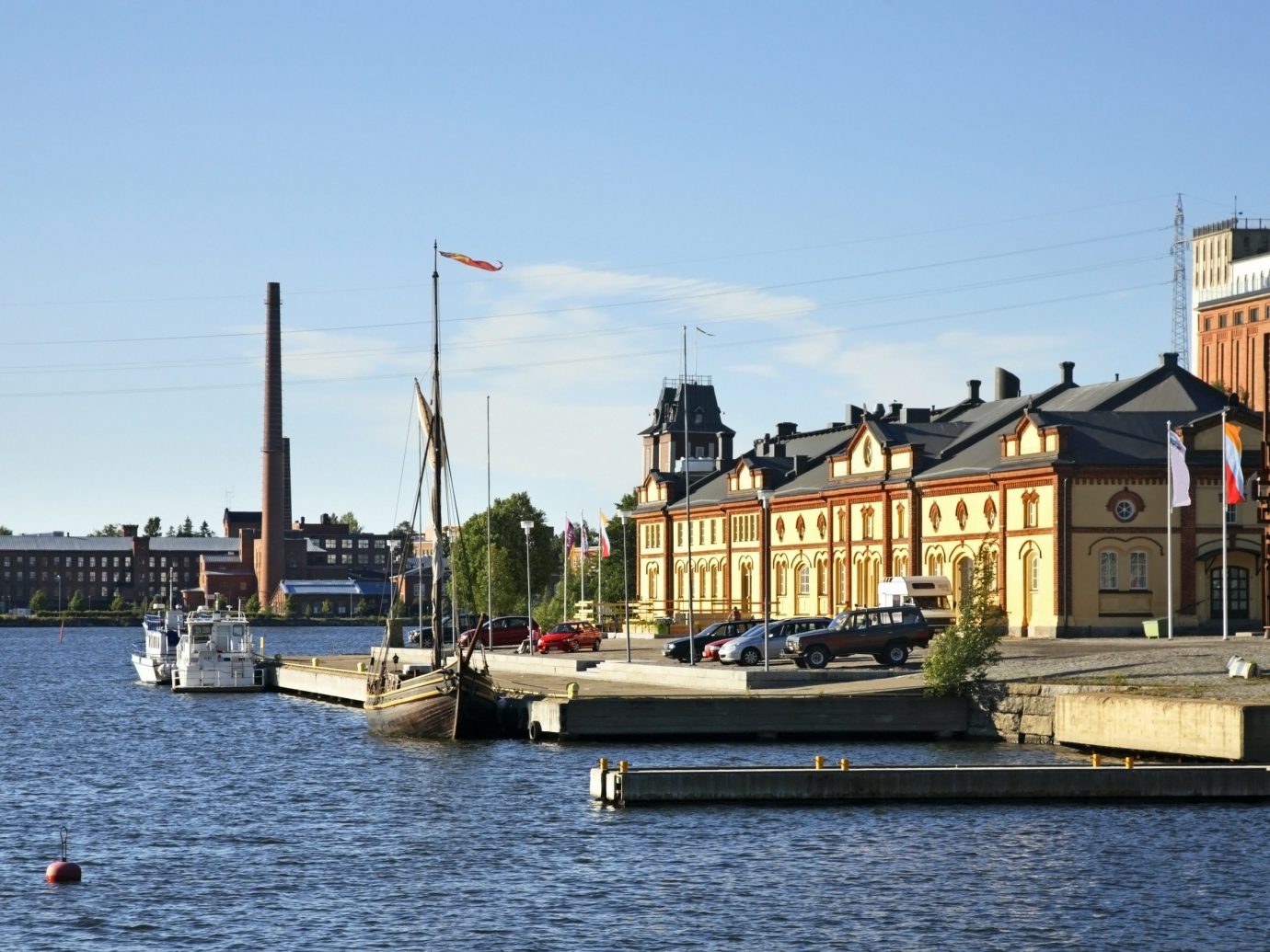 Finland Trip Ideas sky water outdoor waterway body of water Boat Harbor water transportation Town Canal channel vehicle River City boating watercraft marina tree port ship house day