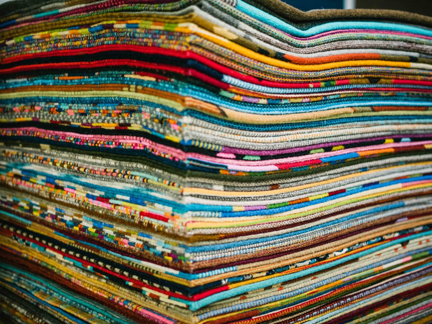 Arts + Culture Mexico Oaxaca Trip Ideas textile thread material colorful pattern stack colored