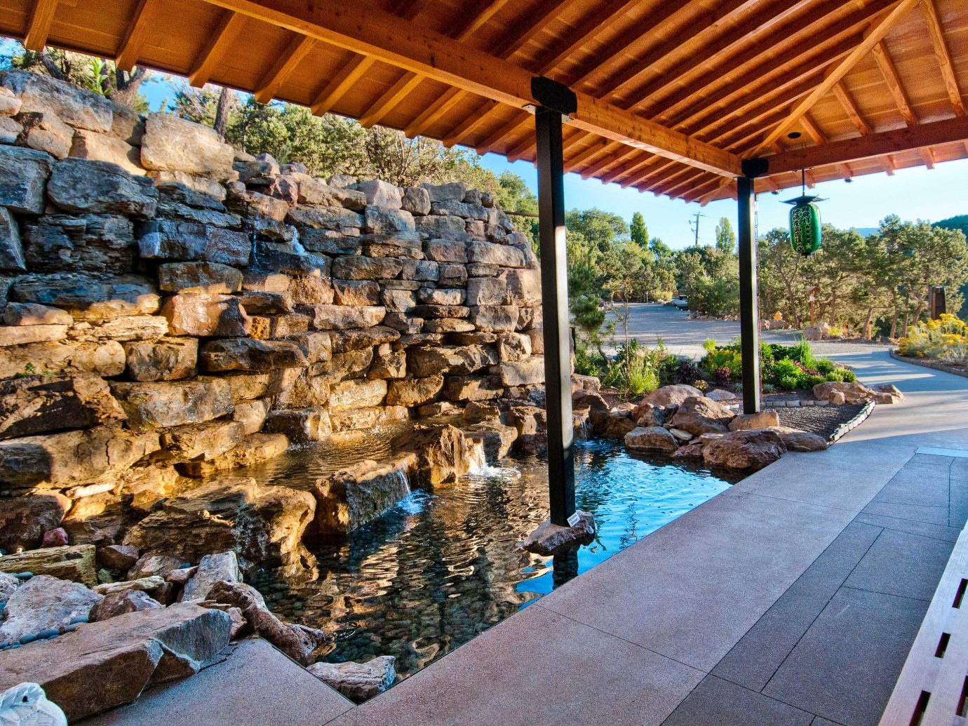 water landscape outdoor structure real estate backyard swimming pool landscaping Patio water feature rock