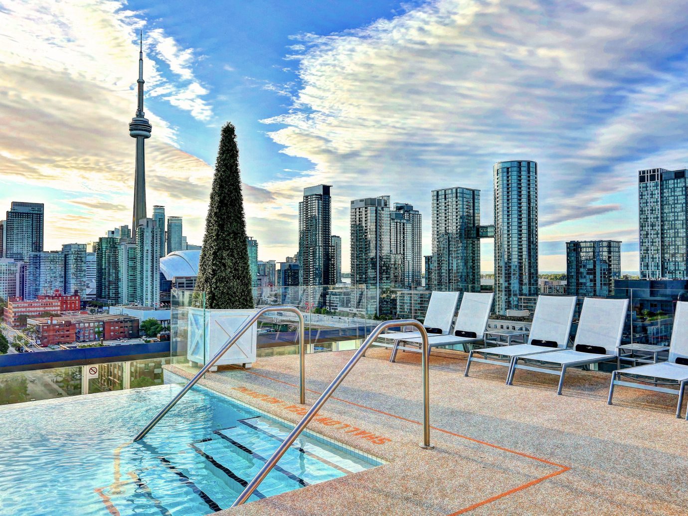 Canada Hotels Toronto sky outdoor condominium leisure property City skyline human settlement plaza skyscraper Downtown residential area cityscape tower block real estate estate overlooking day