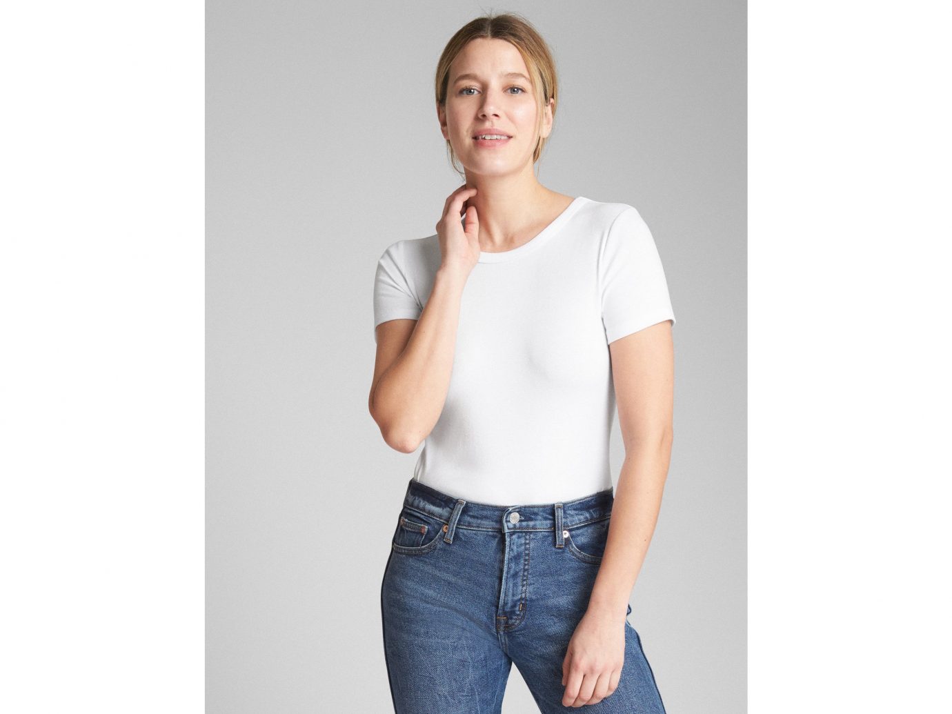 Spring Travel Style + Design Summer Travel Travel Lifestyle Travel Shop person wall clothing white indoor standing shoulder posing t shirt sleeve neck joint fashion model muscle jeans waist trouser