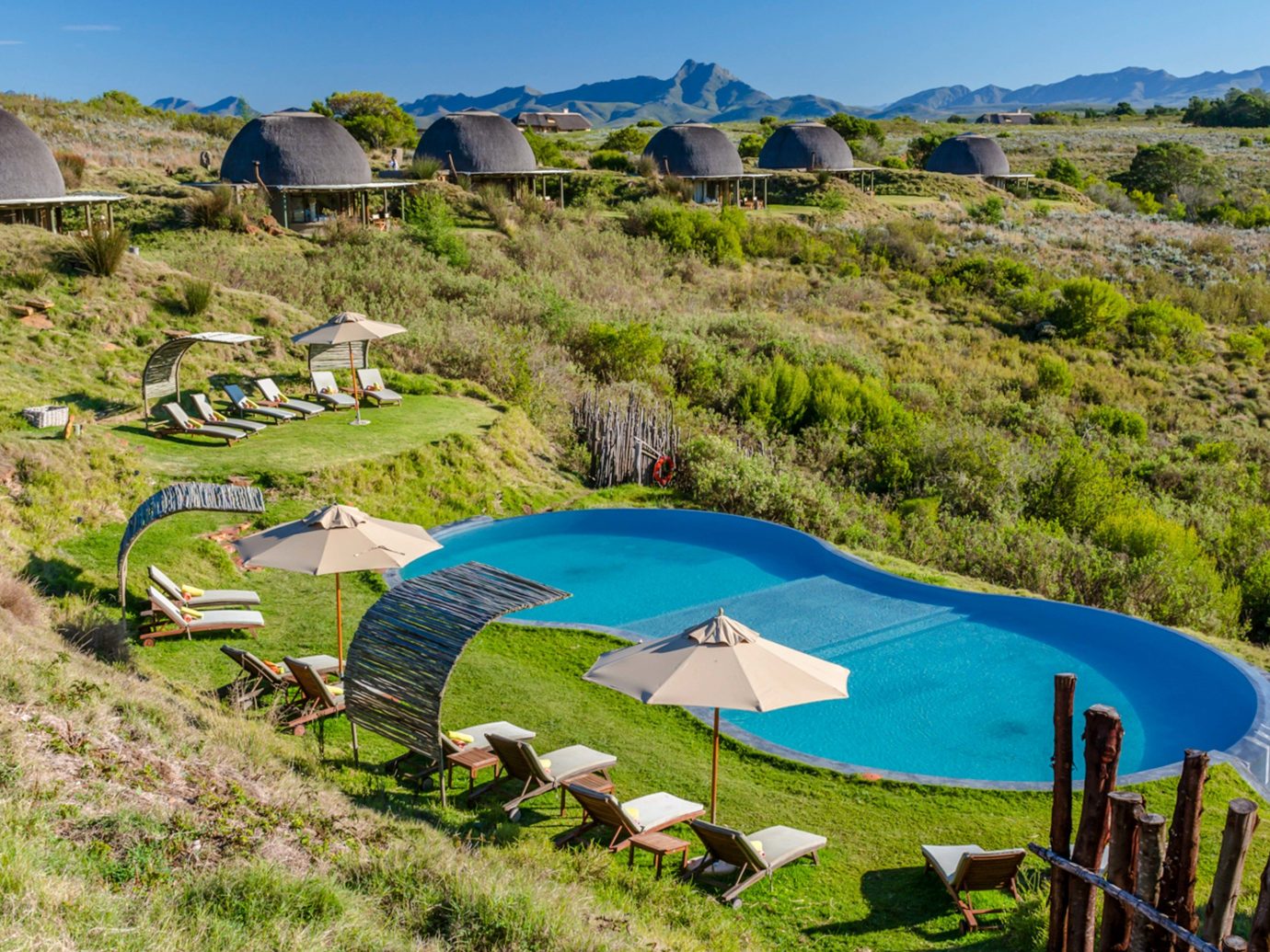 Gondwana Game Reserve; property leisure real estate rural area Resort tree estate landscape swimming pool plant tourism grass sky aerial photography bay land lot water Villa house Village