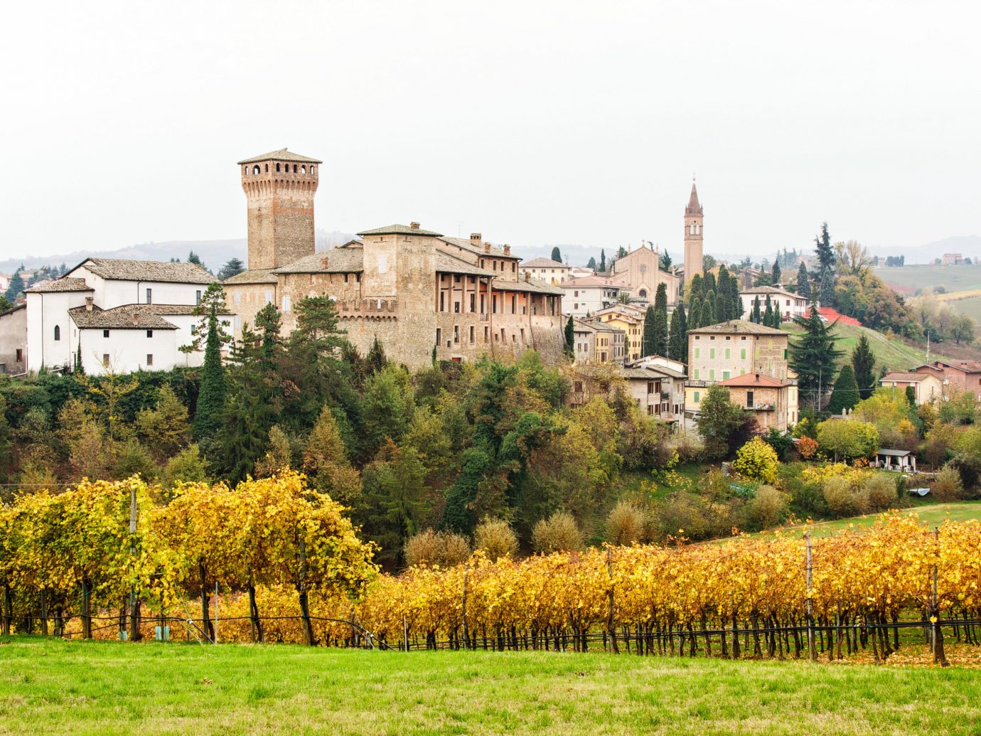 europe Italy Off-the-beaten Path Trip Ideas Village sky Town field agriculture Vineyard rural area tree château stately home estate meadow national trust for places of historic interest or natural beauty landscape hill grass house grassland castle autumn middle ages