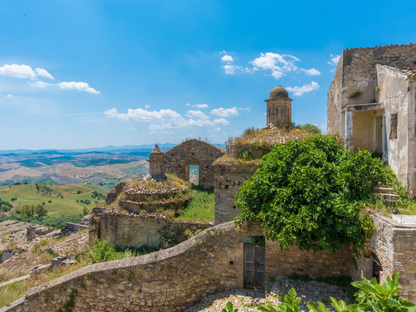 europe Italy Off-the-beaten Path Trip Ideas outdoor sky grass fortification historic site ancient history archaeological site Ruins wall stone Village history cloud tree mountain rock castle landscape middle ages tourism hillside