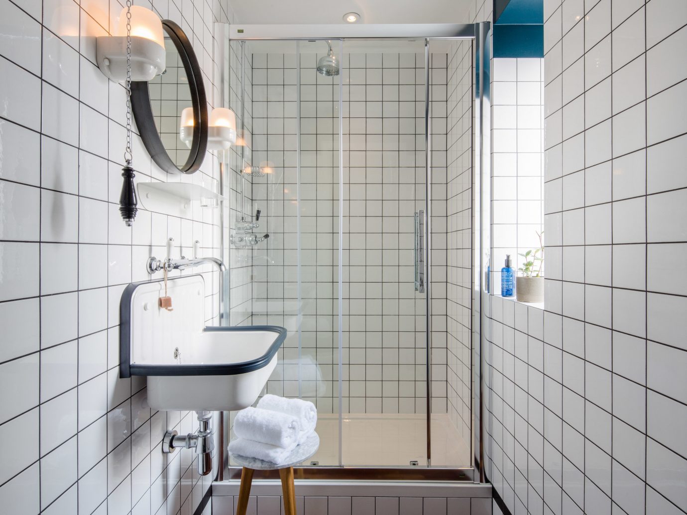 bathroom room tile wall interior design plumbing fixture floor flooring window toilet daylighting