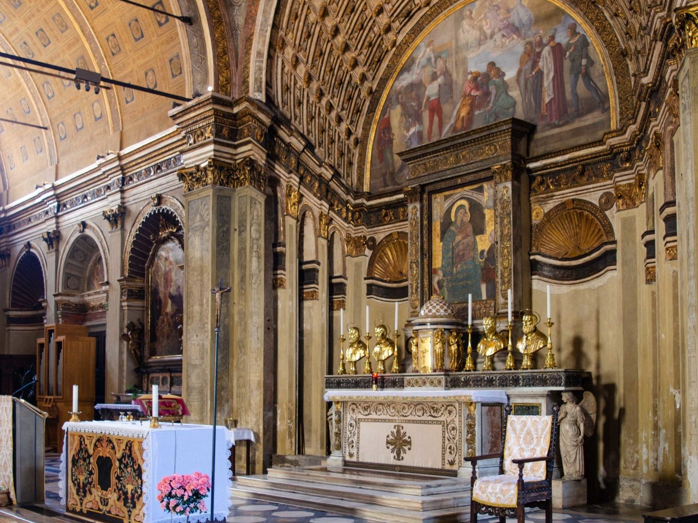 Arts + Culture Italy Milan building arch place of worship column Church interior design basilica tourist attraction chapel byzantine architecture religious institute medieval architecture window arcade cathedral altar crypt historic site baptistery colonnade